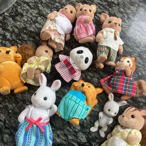 Assorted Calico Critters Panda, Bunny, squirrel